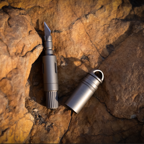 DartInk – Quick-Release Titanium Mini Pen & Knife