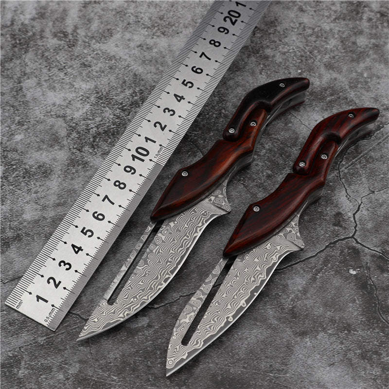 Forged for the Wild: Damascus Steel Camp Mechanical Lock Folding Knife