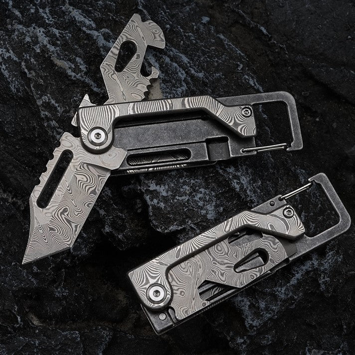 The Dual-Action Blade: 9-in-1 Damascus Keychain Folding Knife
